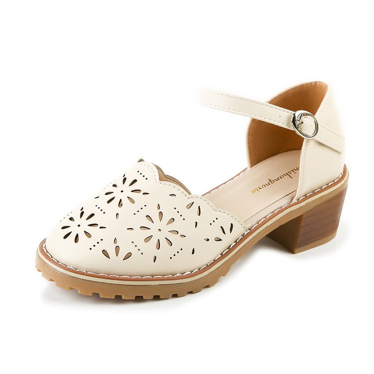 Cut out Roman sandals with thick heels