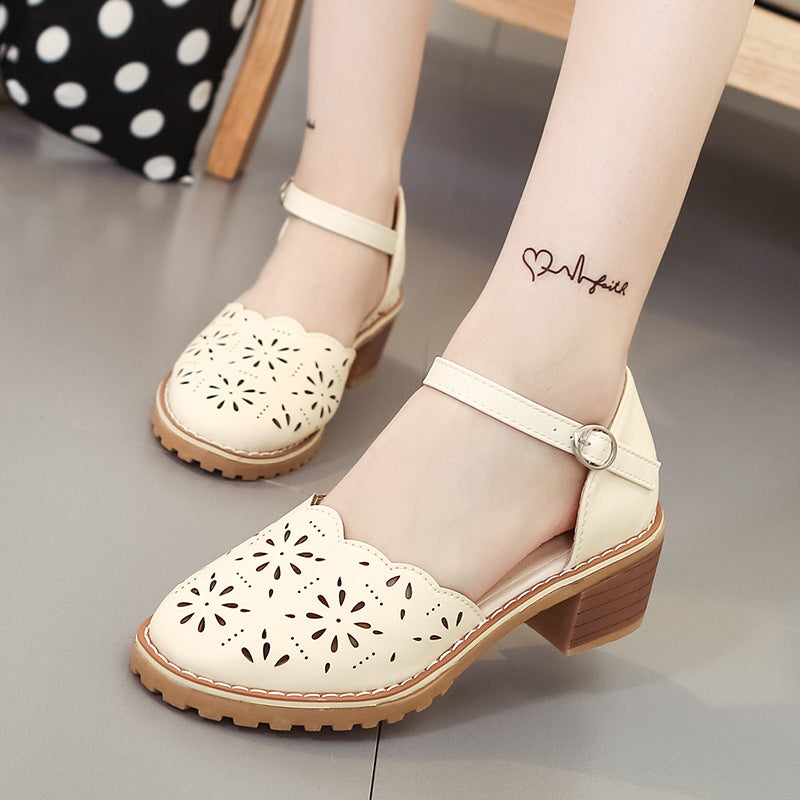 Cut out Roman sandals with thick heels