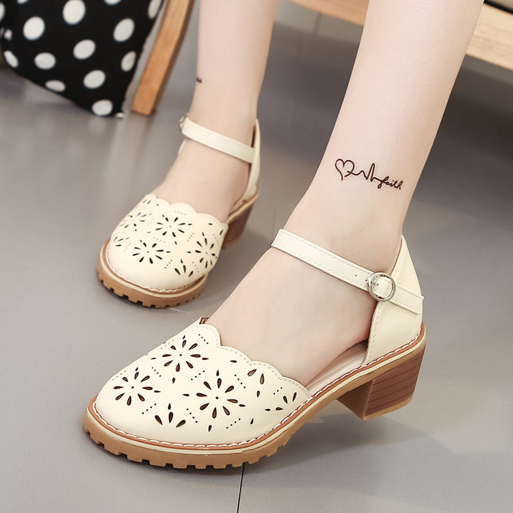 Cut out Roman sandals with thick heels