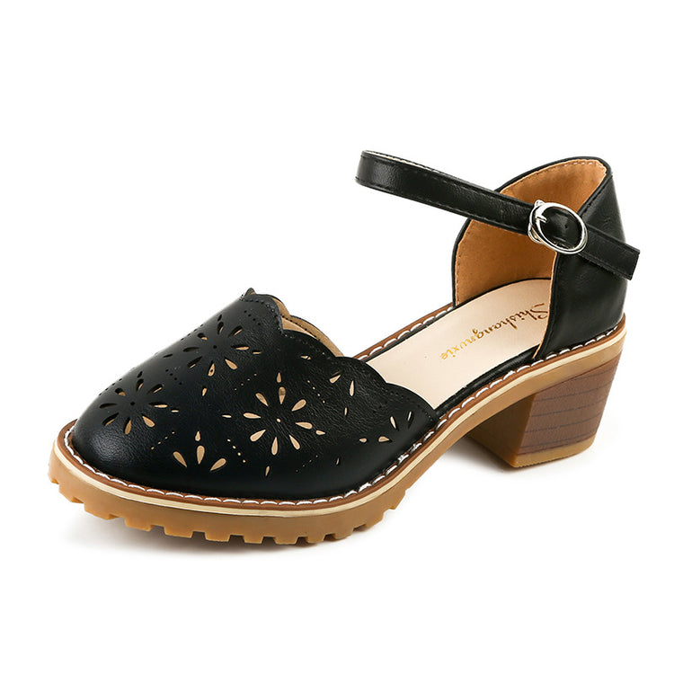 Cut out Roman sandals with thick heels
