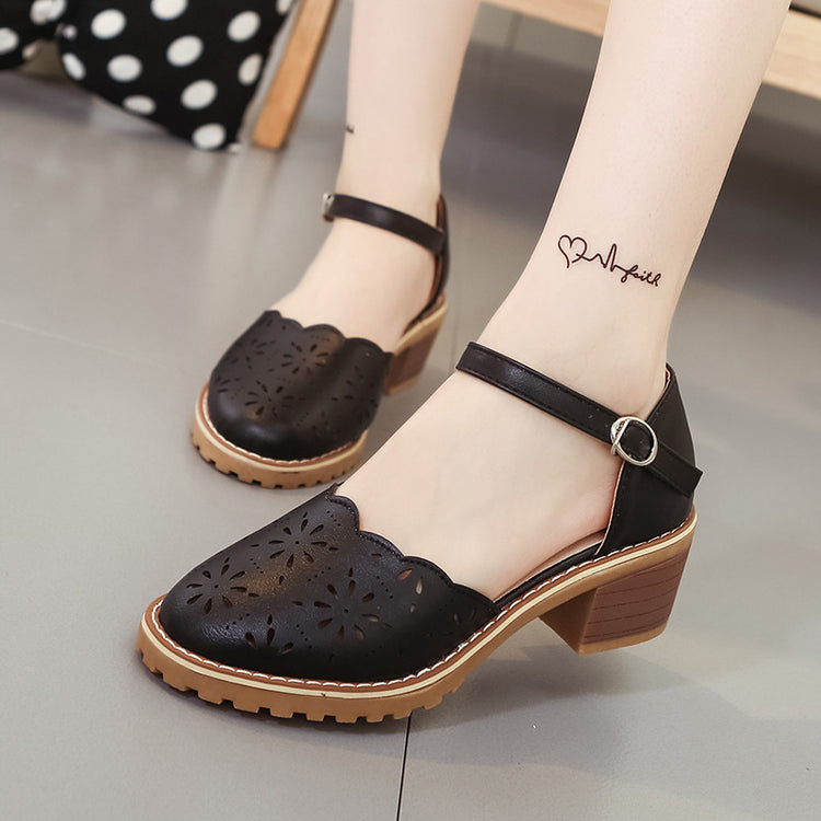 Cut out Roman sandals with thick heels